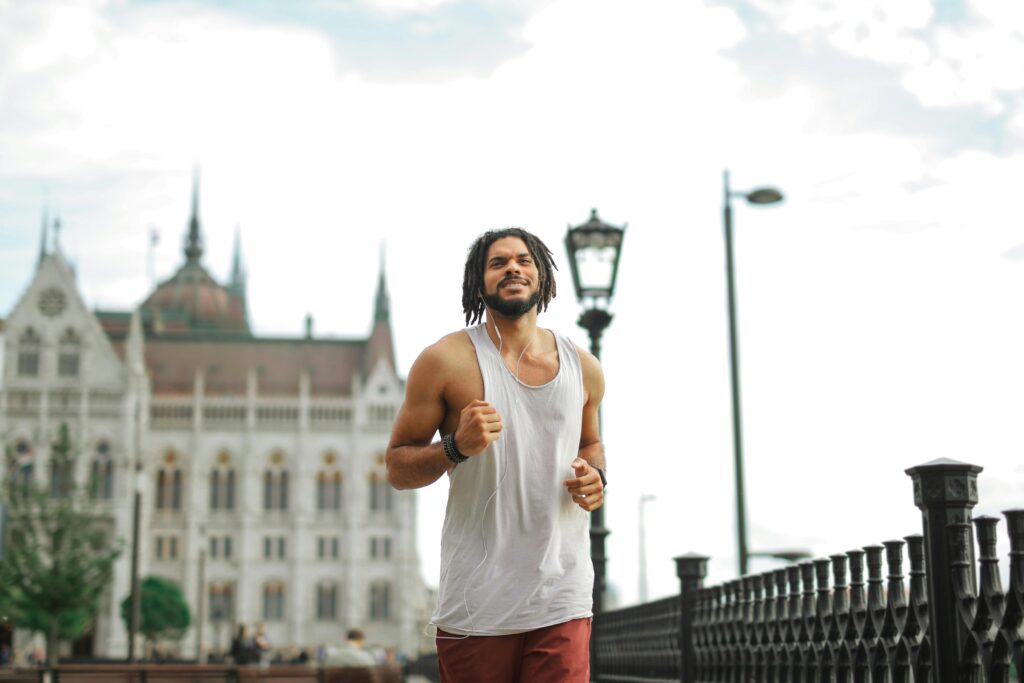 a man running in front of a building